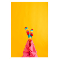 Umělecká fotografie Woman wearing colorful socks against yellow, Westend61, (26.7 x 40 cm)