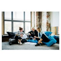 Fotografie Businesswomen talking during an informal meeting, Hinterhaus Productions, 40 × 26.7 c