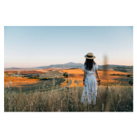 Fotografie Young woman admiring sunset in a, FilippoBacci, 40 × 26.7 cm