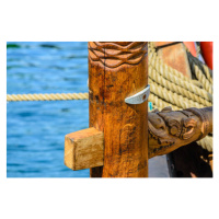 Ilustrace Close-up of a hand carved rudder, Grb, 40 × 26.7 cm