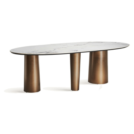Estila Luxusní oválný jídelní stůl Marinna v art deco stylu s asymetrickými zlatýma nohama a bíl
