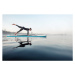 Fotografie Woman practicing paddle board yoga on, Westend61, 40 × 26.7 cm