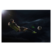 Fotografie Soccer player kicking the ball in the air, Stanislaw Pytel, (40 x 26.7 cm)
