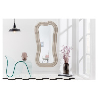 Estila Asymetrické designové zrcadlo Swan s polyuretanovým rámem ve světle béžové barvě s kaskád