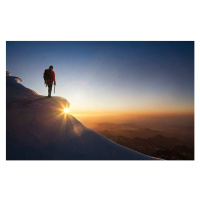 Fotografie Climber on a snowy range at sunset, Buena Vista Images, 40 × 26.7 cm