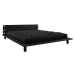 Černá dvoulůžková postel z masivního dřeva s čelem, lampičkami a černou matrací Comfort Karup De