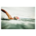 Fotografie Woman taking a breath during open water swim, Thomas Barwick, 40 × 26.7 cm