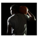 Fotografie man holding basketball on shoulder, Tara Moore, 40 × 40 cm