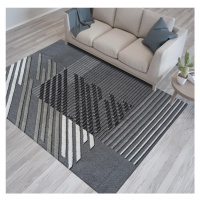 Designový koberec v šedé barvě s pruhy