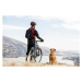 Umělecká fotografie A man mountian biking with his dog., Jordan Siemens, (40 x 26.7 cm)
