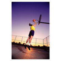 Fotografie Young woman dunking basketball in net,, Stephen Simpson, 26.7x40 cm