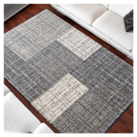 Univerzální moderní koberec šedé barvy