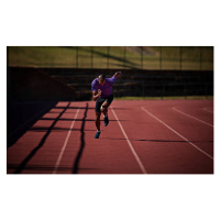 Umělecká fotografie Male runner sprinting at stadium, Klaus Vedfelt, (40 x 24.6 cm)