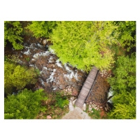 Fotografie Small wooden bridge over river in, SStajic, 40 × 30 cm