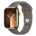 Apple Watch Series 9 Cellular 45mm Zlatá ocel s jílově šedým sportovním řemínkem M/L Zlatá
