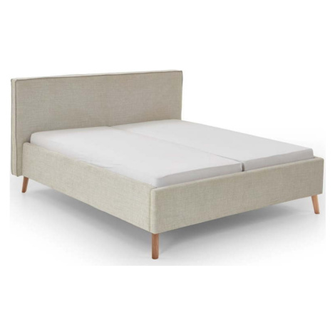 Krémová čalouněná dvoulůžková postel s úložným prostorem s roštem 180x200 cm Riva – Meise Möbel